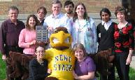 The awardees pose with mascot Flash in front of the Science Research Building